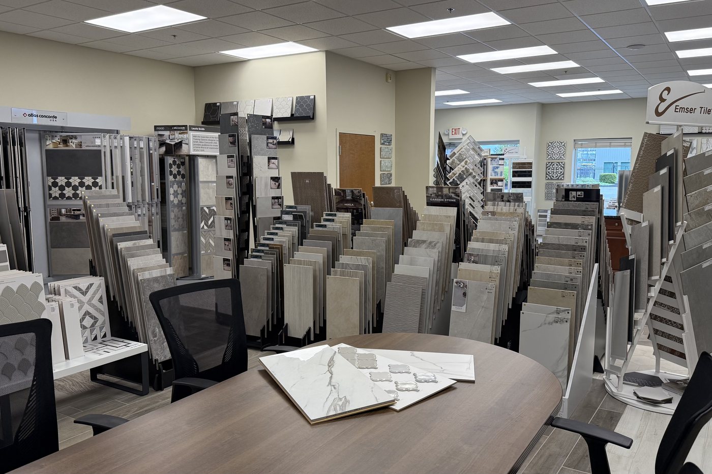 Tile displays and a selection table in the Brewer Custom Floors showroom